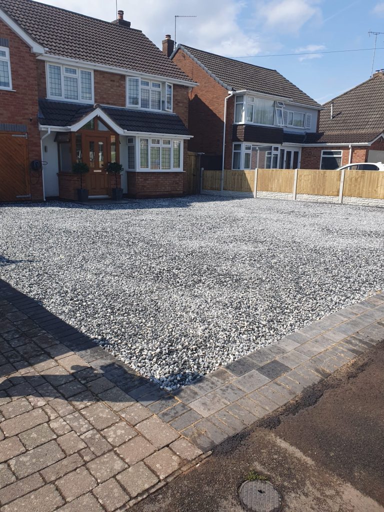 Brick pathway and landscaped garden