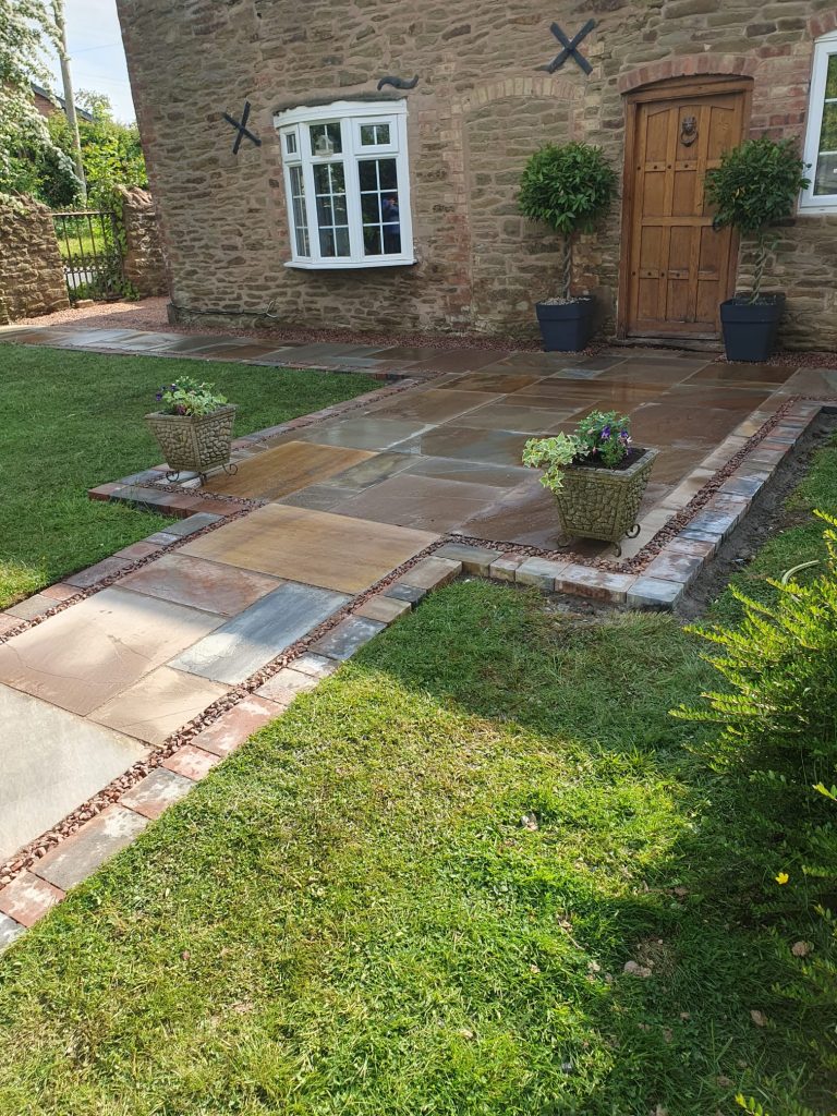 Brick pathway and landscaped garden